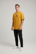 Photo 1 — White Model, Mustard Tee